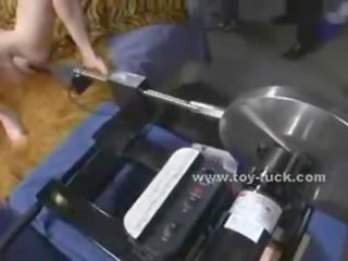 Blonde divinity with small tits takes off her clothes and sets up testing fucking machines masturbating